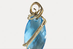 Wire wrapped around marquise pendant